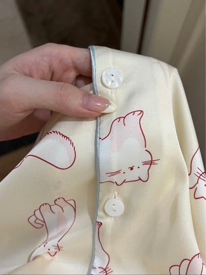 Soft Yellow Pajama Set with Red Outline Kitty Design